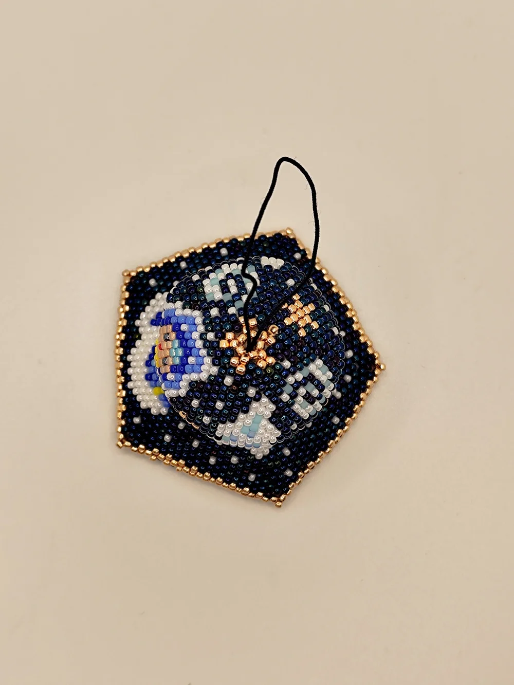 Handmade Blue Beaded Bell Ornament with Angel Design